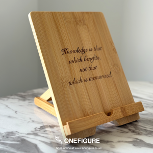 a wooden plaque on a marble table